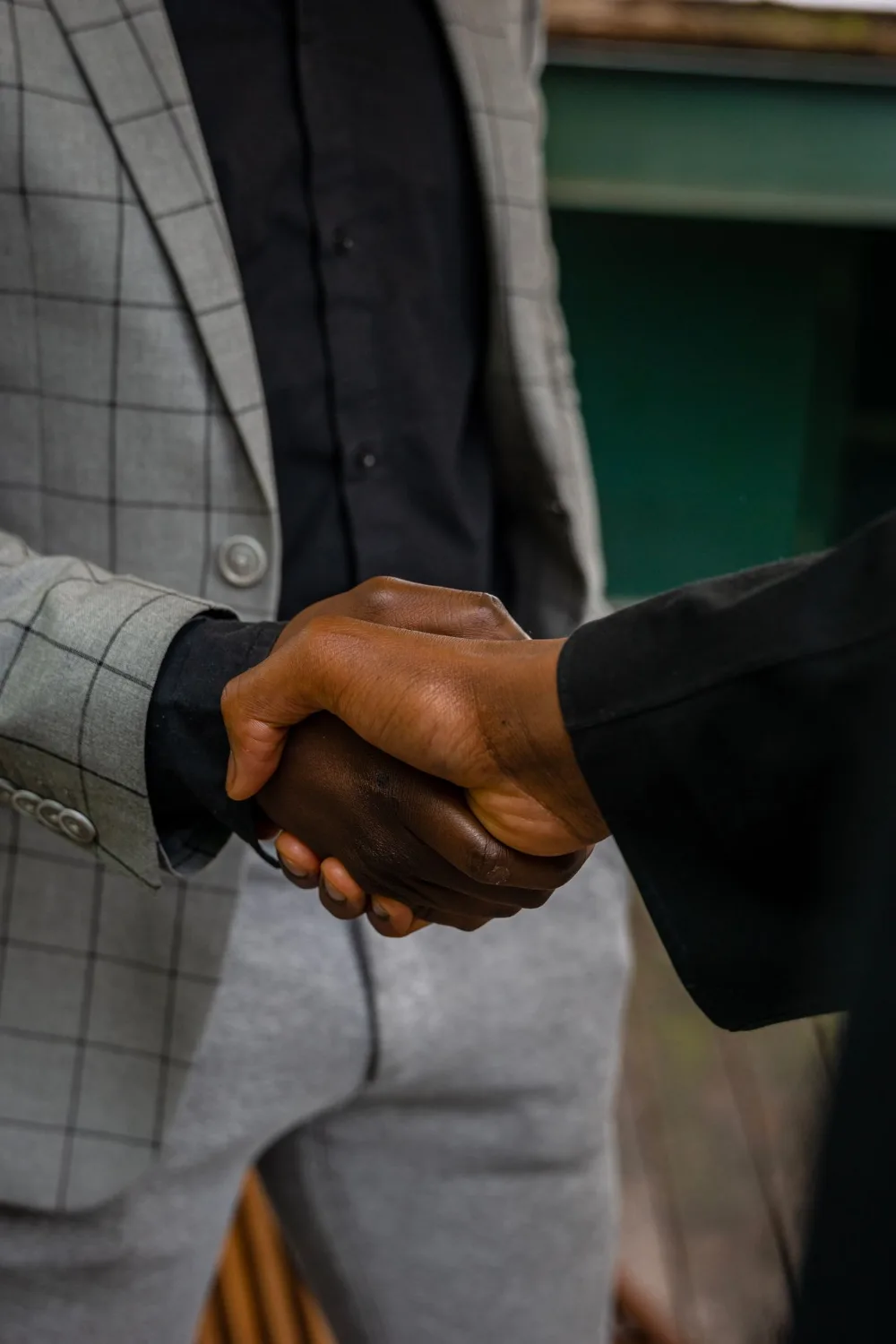 Two business partners shaking hands
